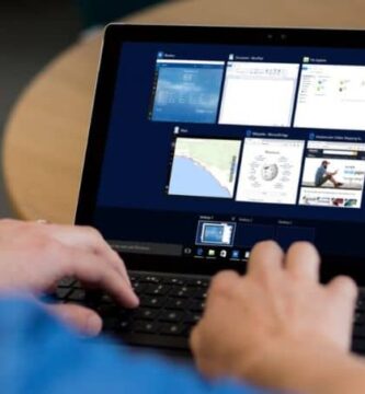 persona laptop iconos