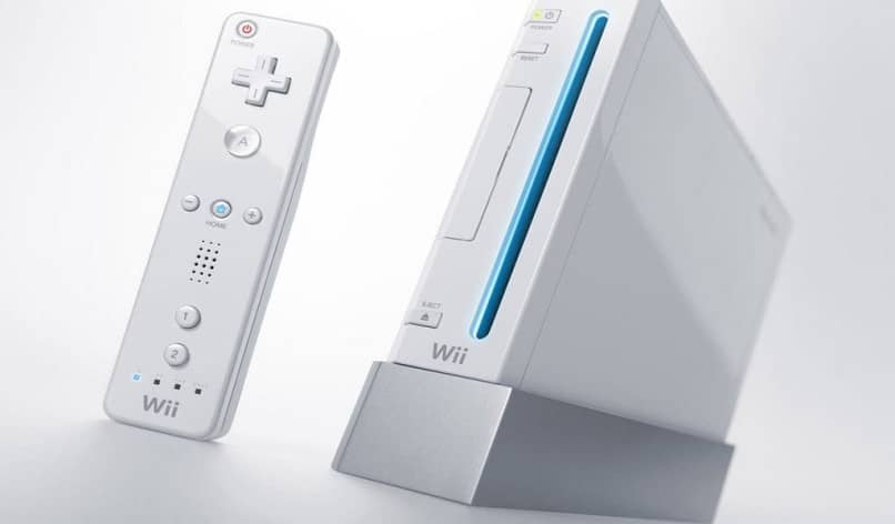valkoinen wii-konsoli ja ohjain