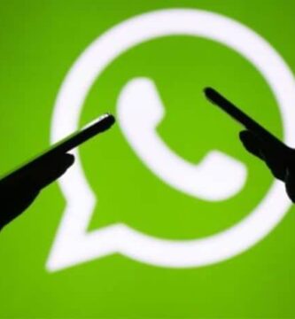 movil manos siluetas whatsapp icono